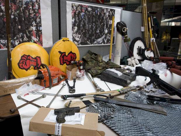 Police Reveal Weapons Seized From So-Called Demonstrators: aluminum bats, bamboo rod, body armour, bottles of hot sauce, crowbars, dog repellent, electric drill, machetes, saws, shields and sledgehammers.